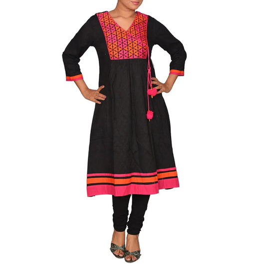 black tissue suit with pink embroidered yoke