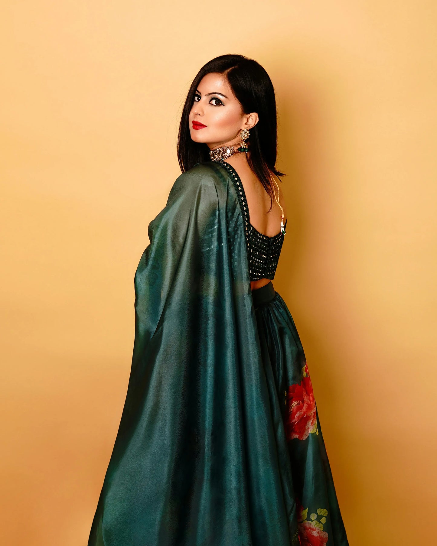dark teal satin saree with floral print and mirror blouse